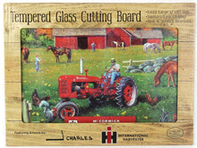 Load image into Gallery viewer, IH McCormick Farmall C Tractor in Farm Scene Glass Cutting Board, 15.5in x 11.75in